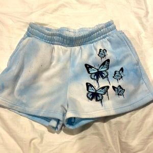 Shorts size M color light blue.